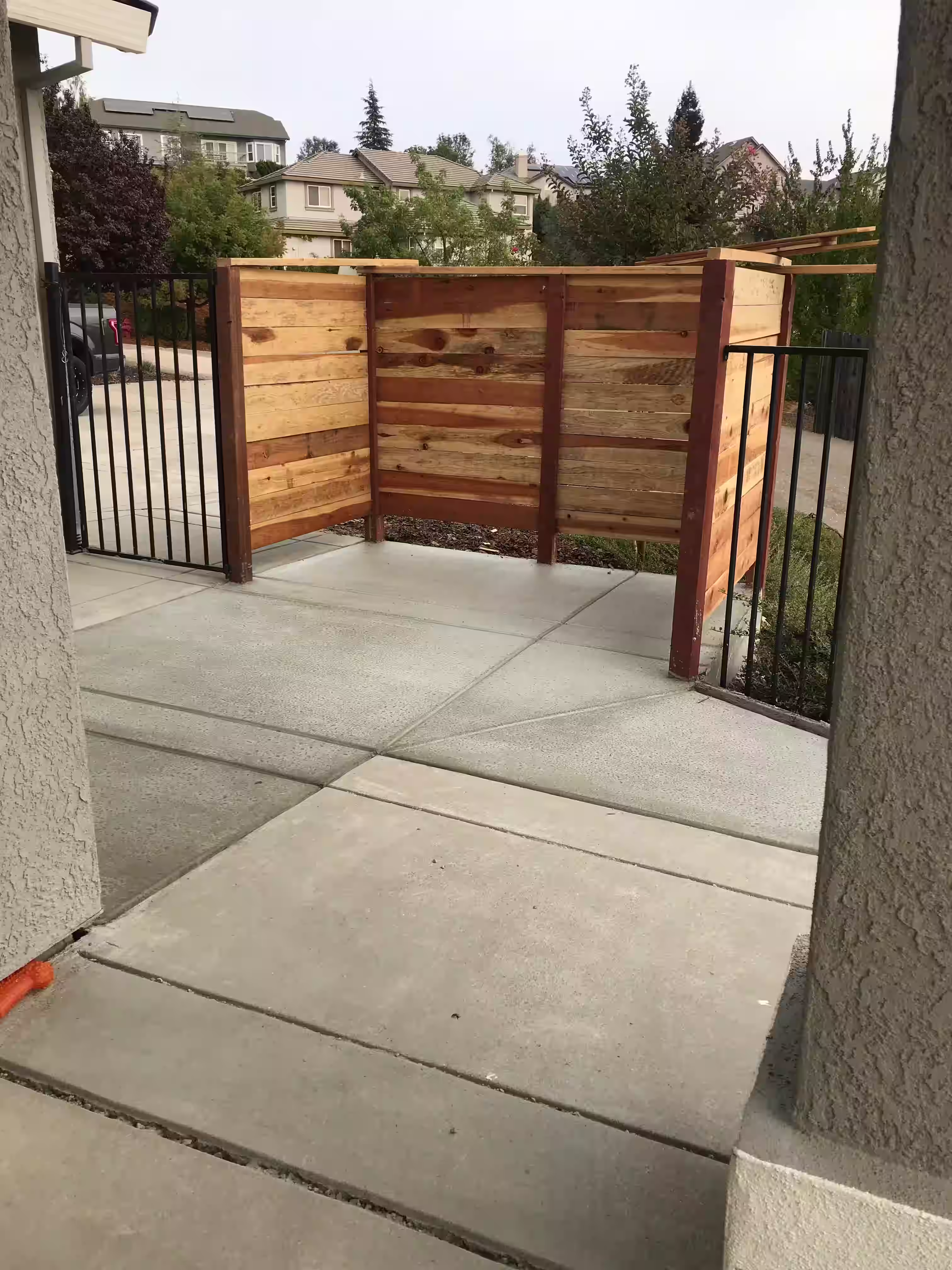 New concrete patio and fencing