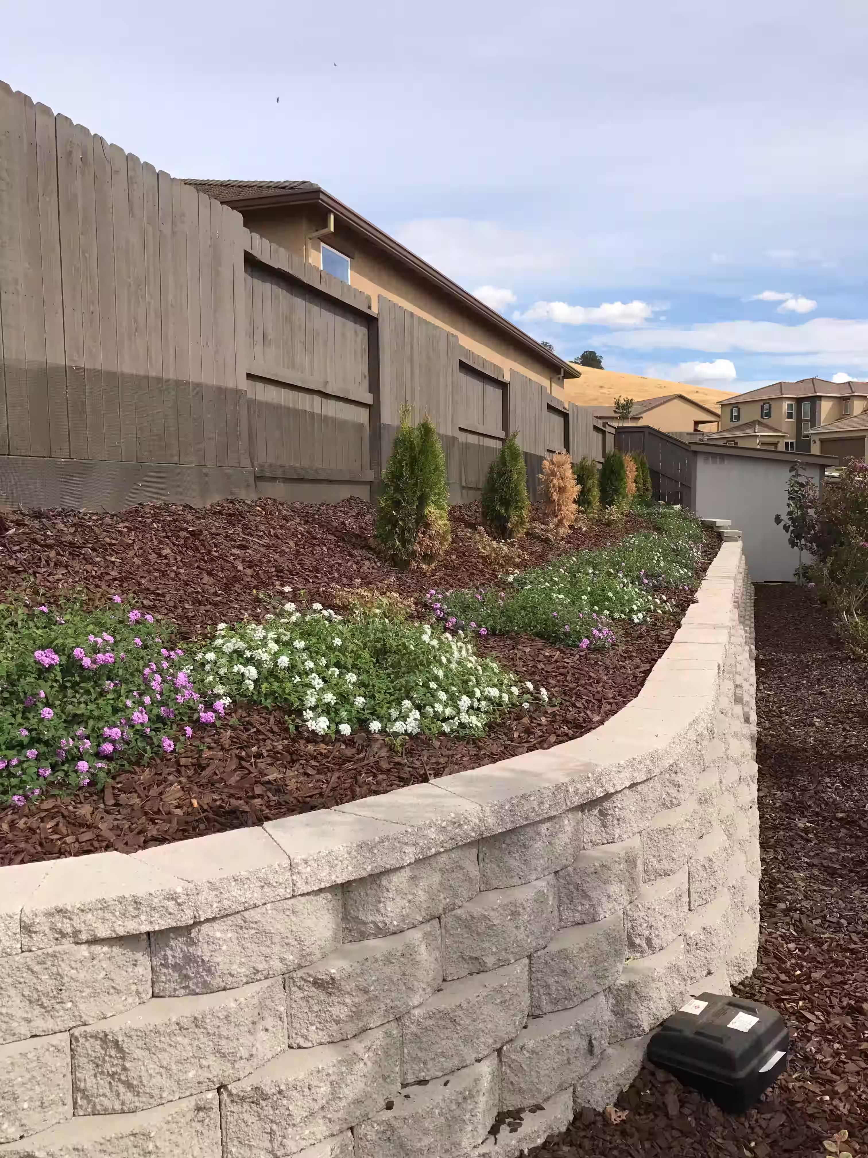 Retaining walls at the edge of your property for both functionality and visual appeal