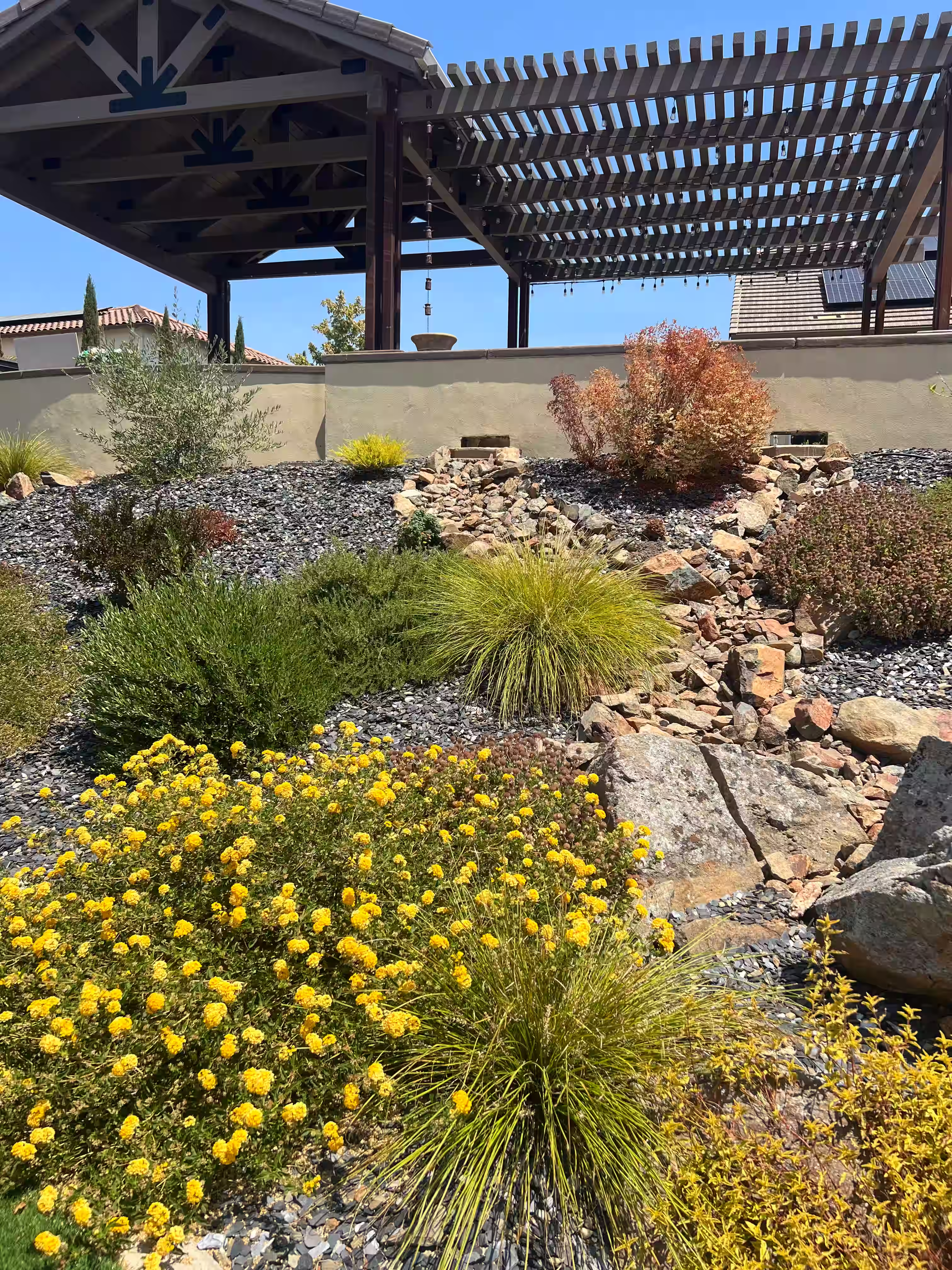 Hillside hardscape design for proper drainage