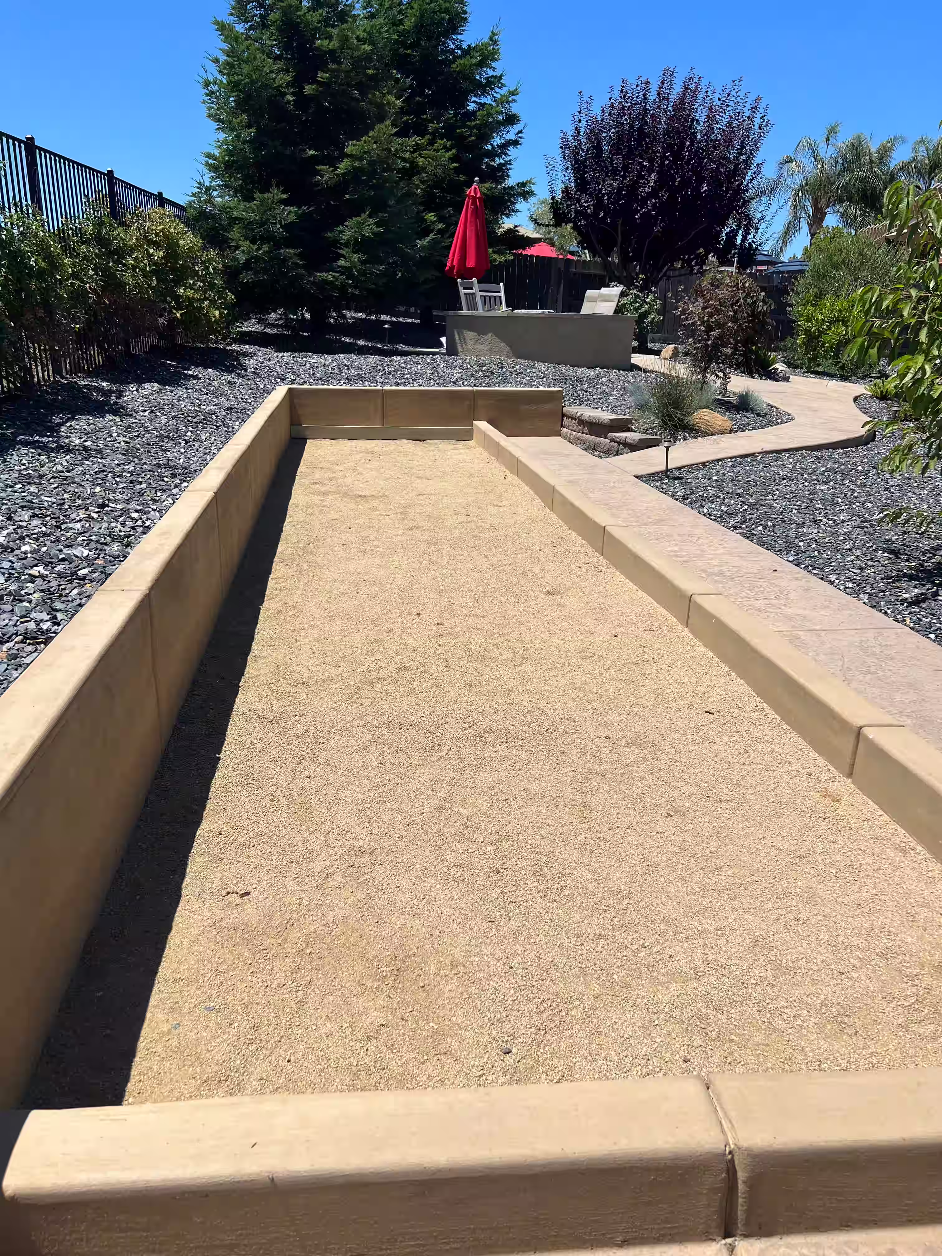 Bocce ball court integrated with retaining walls