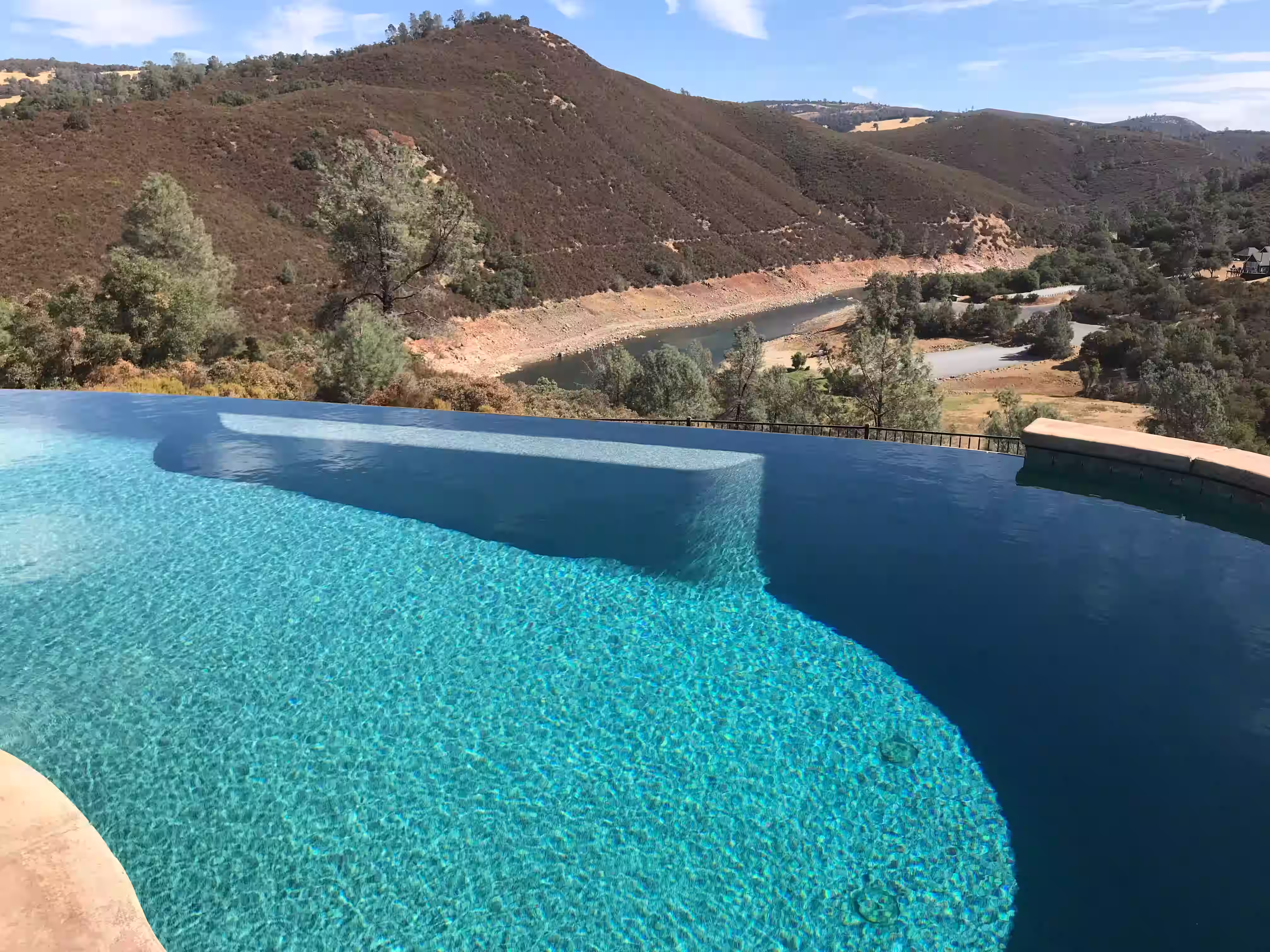 Poolside landscaping that takes into account your property's surrounding area