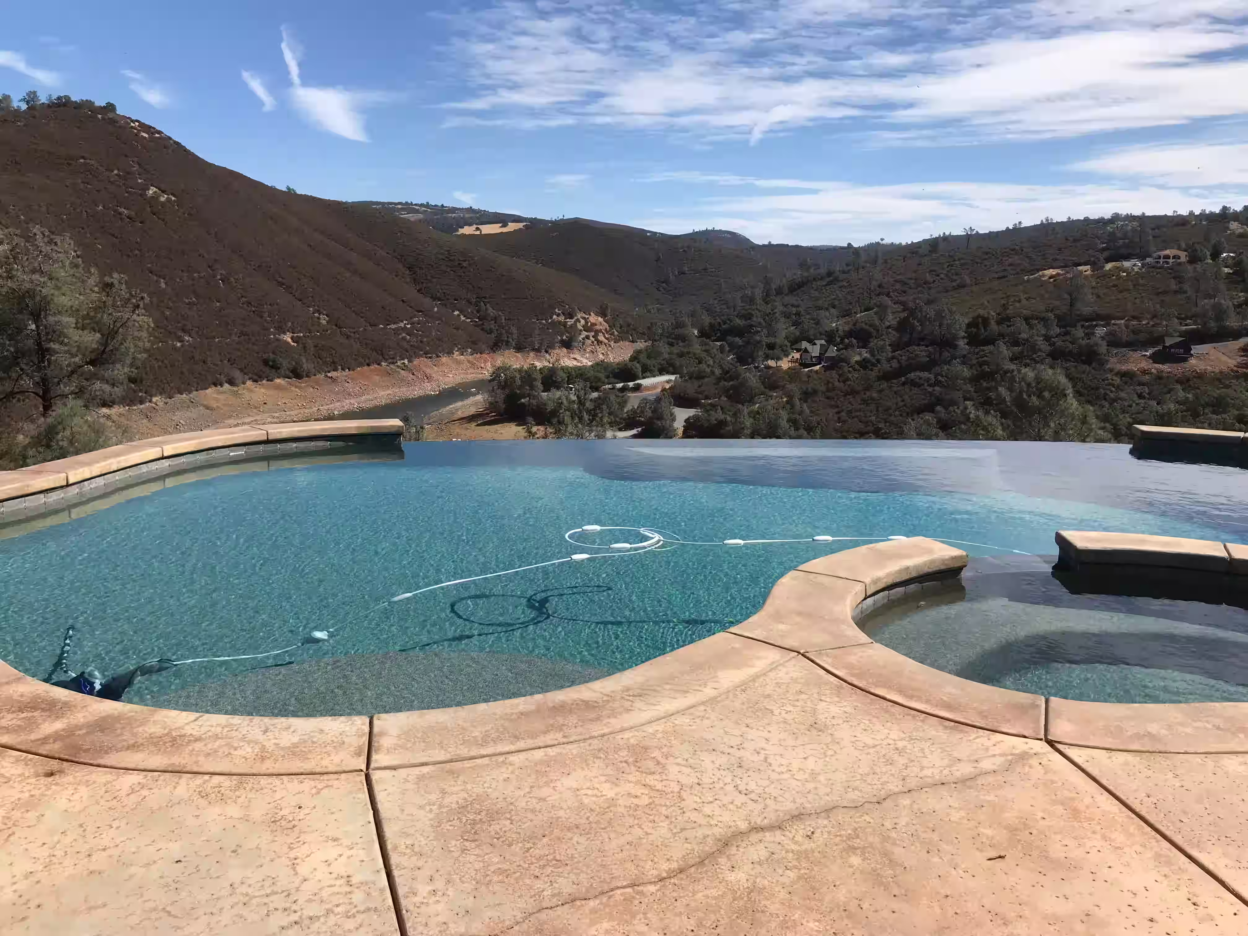 Poolside landscaping that doesn't obstruct the view of the pool or your surrounding area